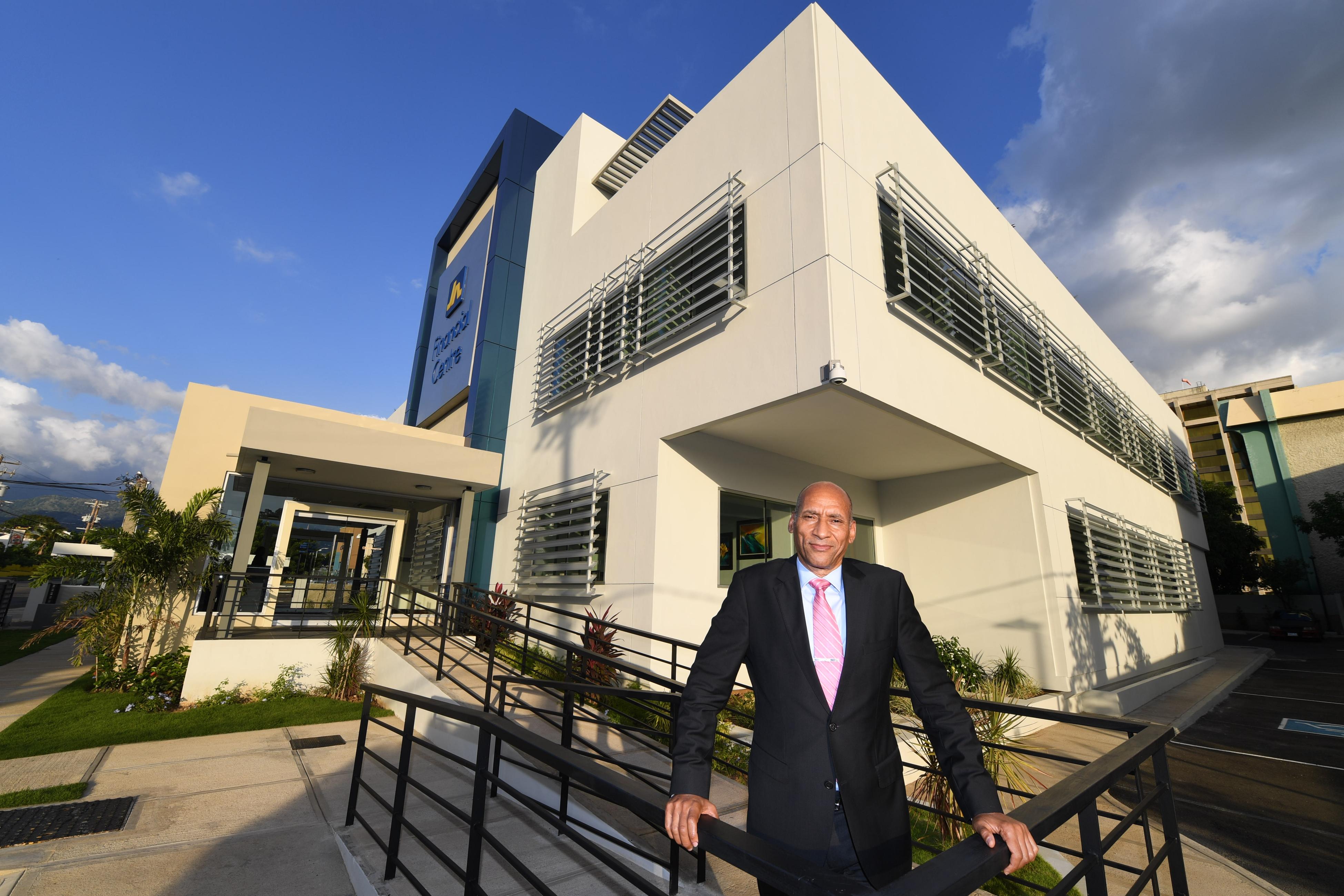 Alan Lewis, in front of the upgraded JN Financial Centre in New Kingston